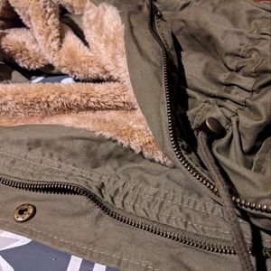 Sleeveless faux fur lined jacket